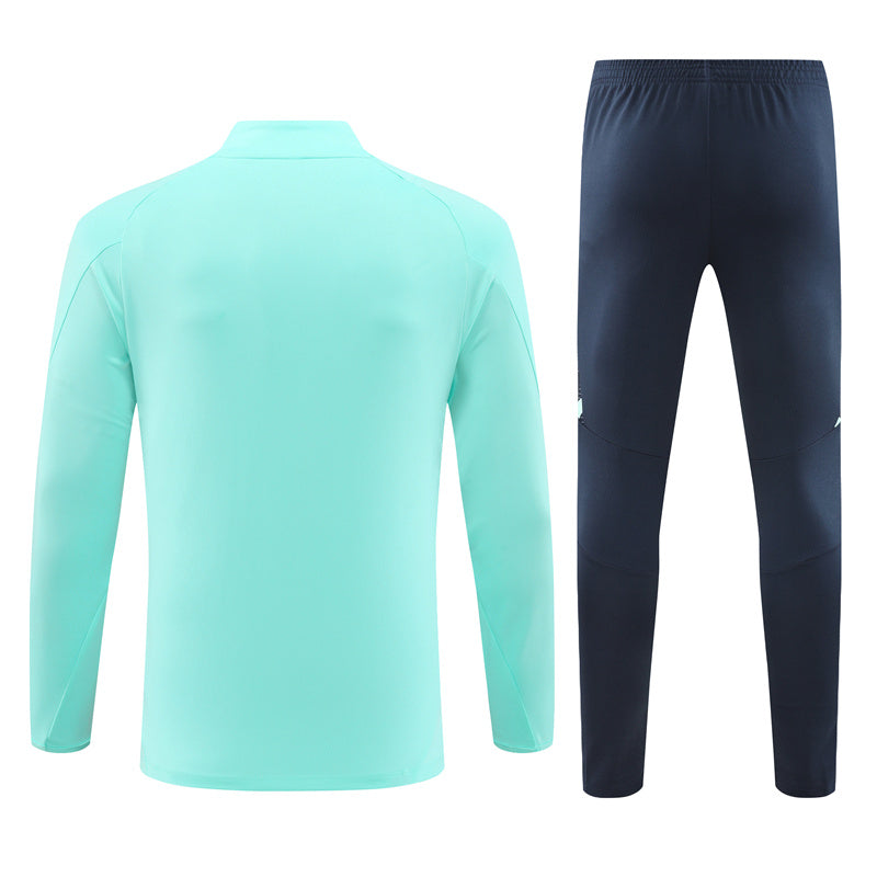 Real Madrid Long Sleeve Zipped Tracksuit Teal/Navy 2024-25